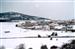 Vista de Valsaín y el rio Eresma tras una nevada.