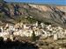 Detalle del pueblo de Sella con la Ermita de Santa Bárbara y al fondo la Peña de Sella.