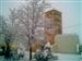 Iglesia y frontón nevados en febrero