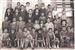 Grupo de niños en la escuela con su Maestro. Años 75-85.